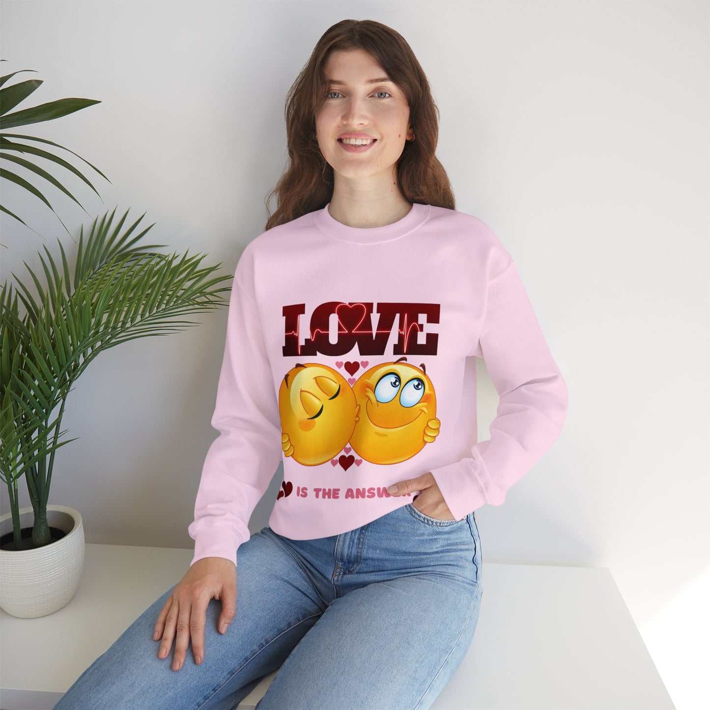 Relaxed-fit Love Is The Answer sweatshirt with cute heart print