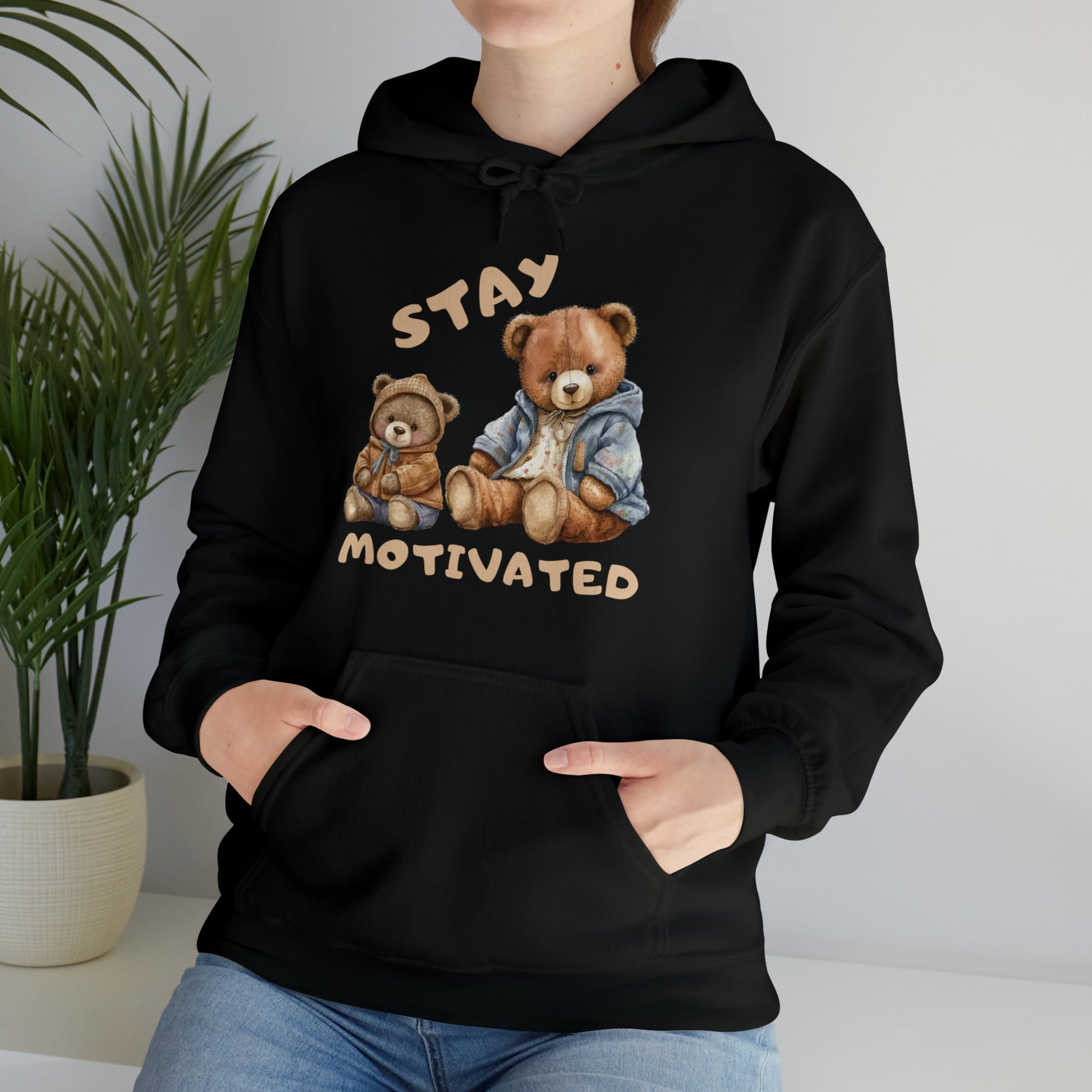 “Stay Motivated hoodie folded flat for product photo display